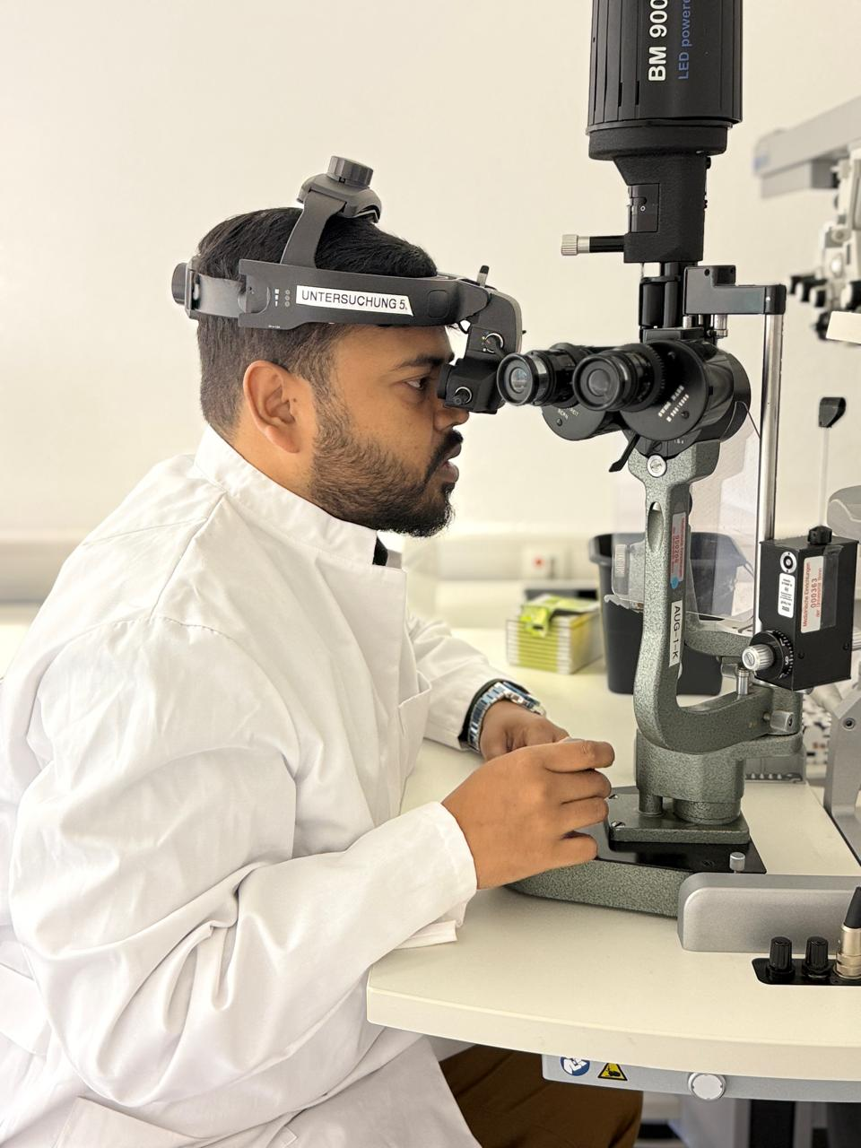 Dr. Dip Biswas Sudip performing eye examination